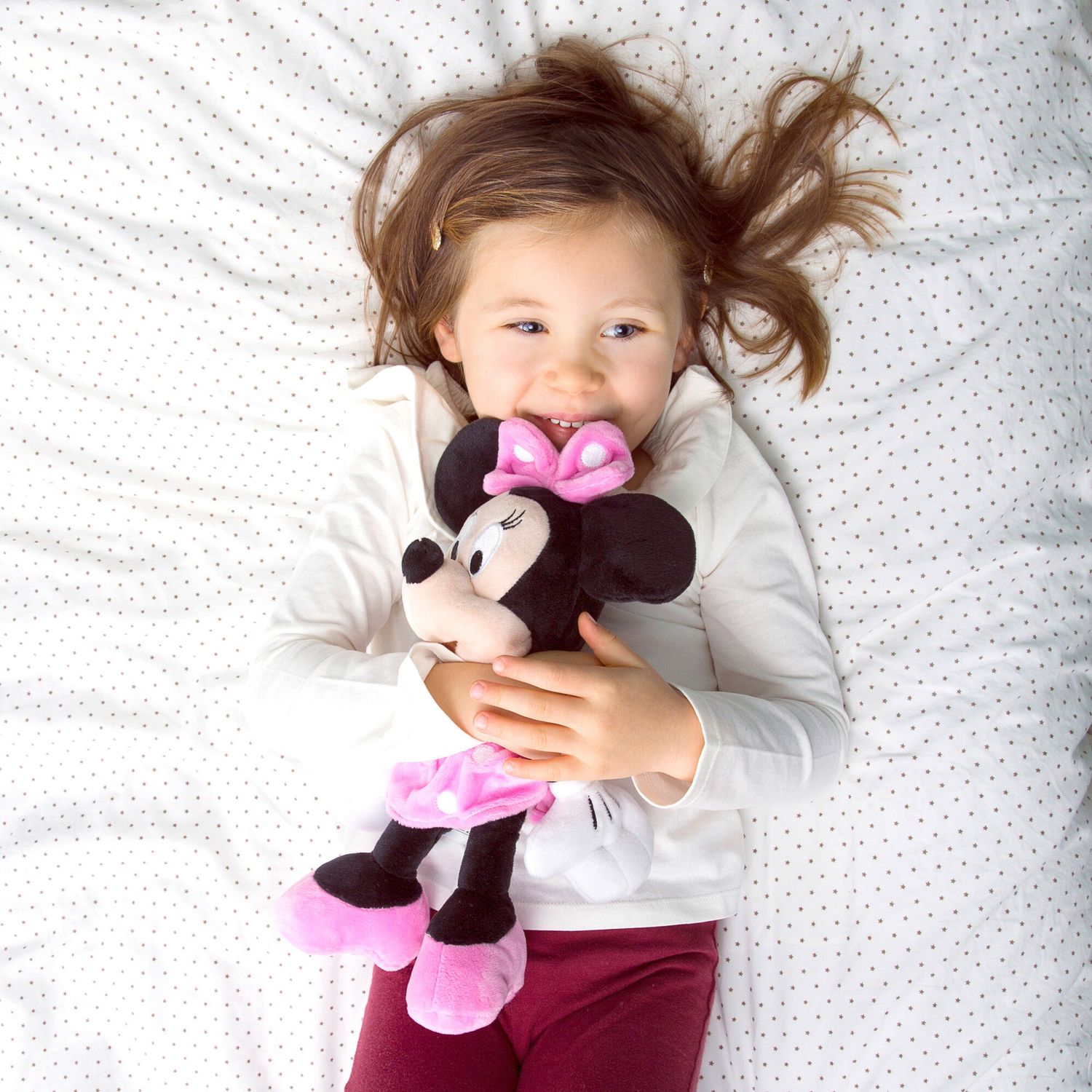 Peluche morbido Minnie con abito fucsia 25 cm - Disney
